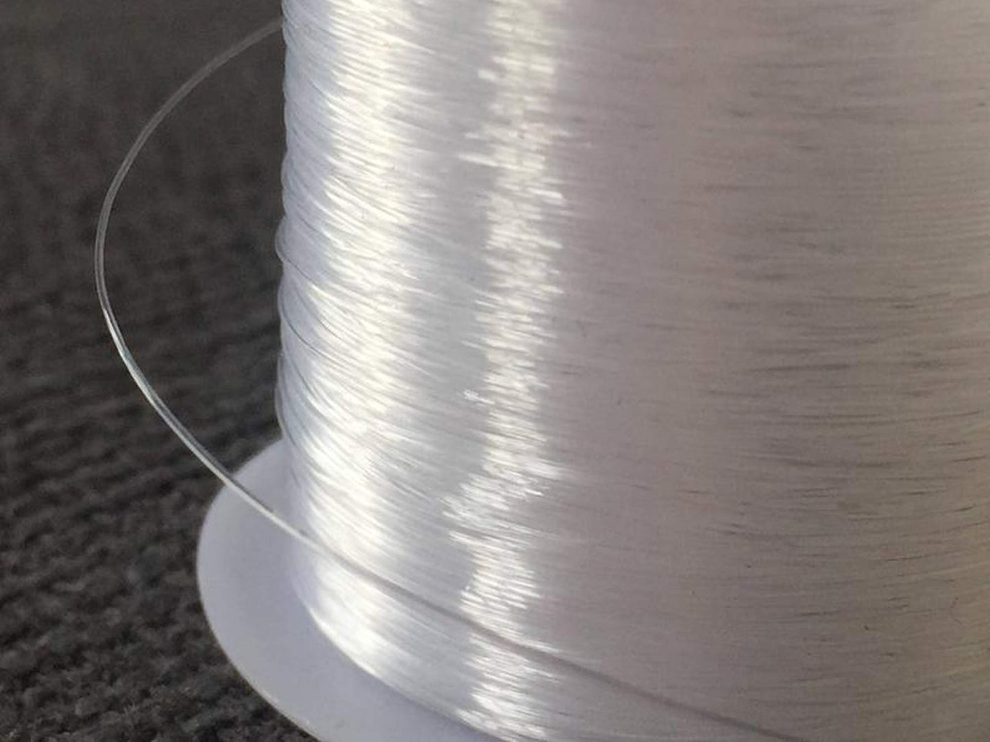 0.7mm Clear Nylon Thread Invisible String Non Stretch Clear Fishing Wire Transparent Plastic Sewing Thread For Hanging Decorations Craft Party Balloon Arch Beading & Jewellery Making - Approx Tensile Strength 20kg (0.7mm x 100m - 1 Spool) Pack Of 1 0.7mm